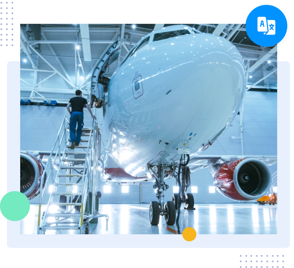 Aircraft undergoing maintenance inspection inside an aviation hangar