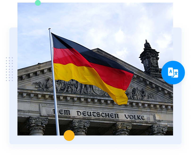 A German flag set in front of a historic-looking government building.