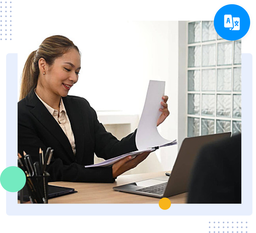 Communications professional reviewing a translated press release at a desk